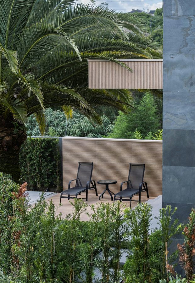 Curved brick paver pathway commercial landscaping Palm Beach